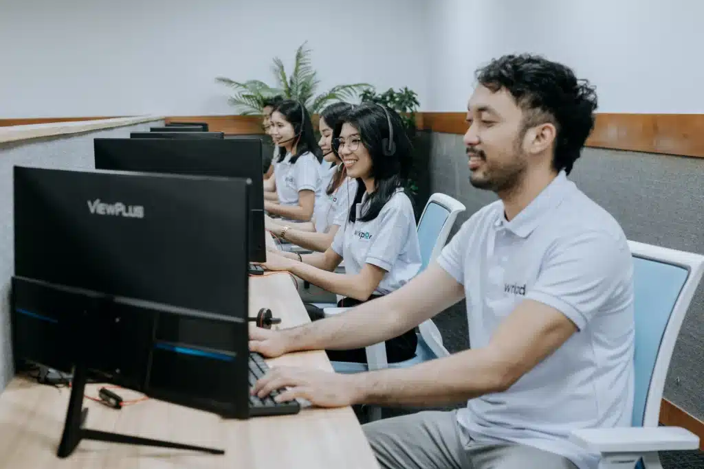 Real estate Virtual assistants working in a modern office in the Philippines